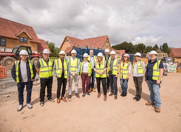 the Oakwrights team standing on site