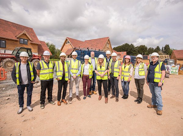 the Oakwrights team standing on site