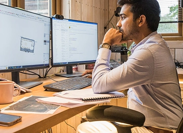 Architectural Designer at computer