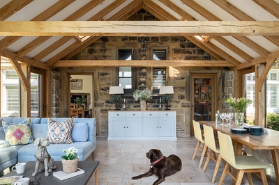 dog inside an oak framed build