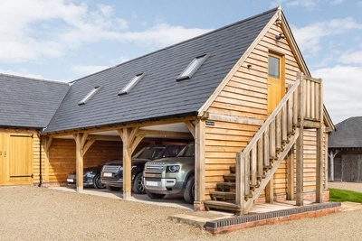 A garage with a room above