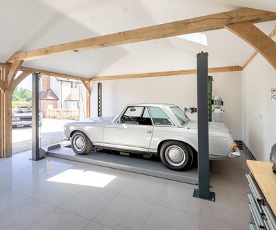 Oak frame garage with car lift