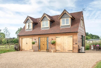 Oak frame garage with accommodation
