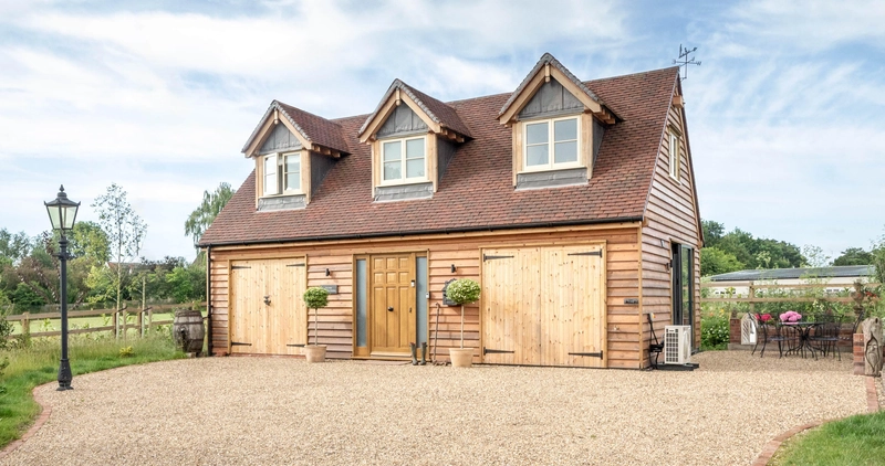 Oak frame garage with accommodation
