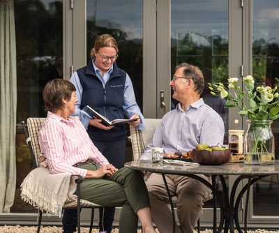 a couple meeting their project manager